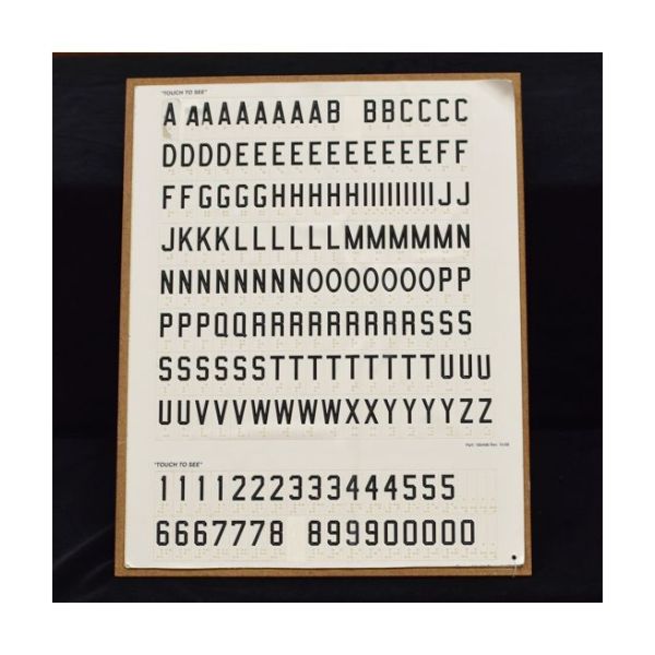 Page of peelable large print capital letters and numbers with Braille.