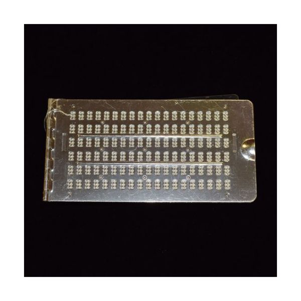 A six-line aluminum slate with with 19 cells per row.