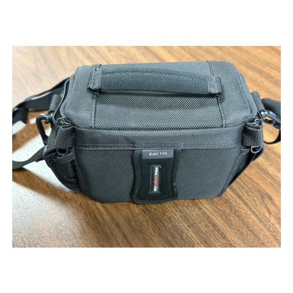 Rear view camera bag shows belt clip.